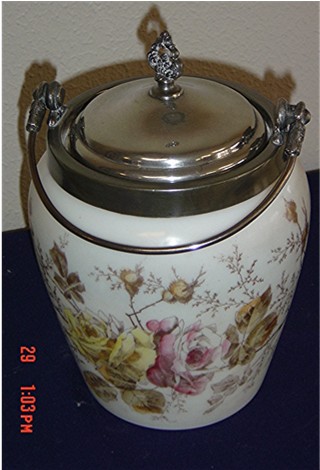 White biscuit barrel/roses